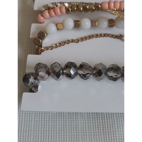 Charlotte Russe Set of 6 Gold Toned and Pink Assorted Beaded Elastic Bracelets - Picture 4 of 10